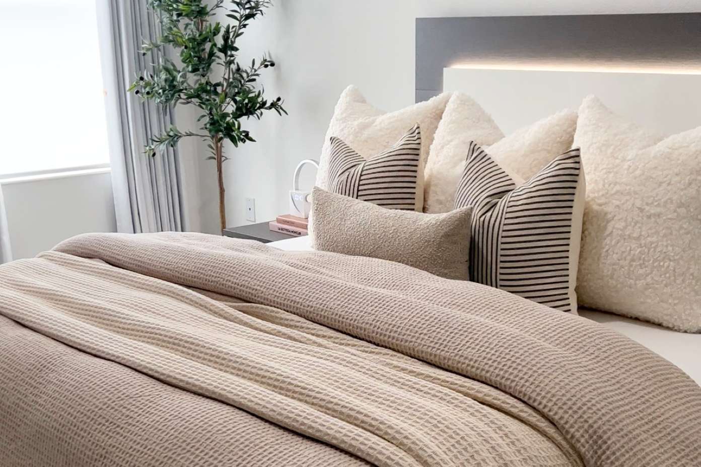 bed with comfortable bedding 