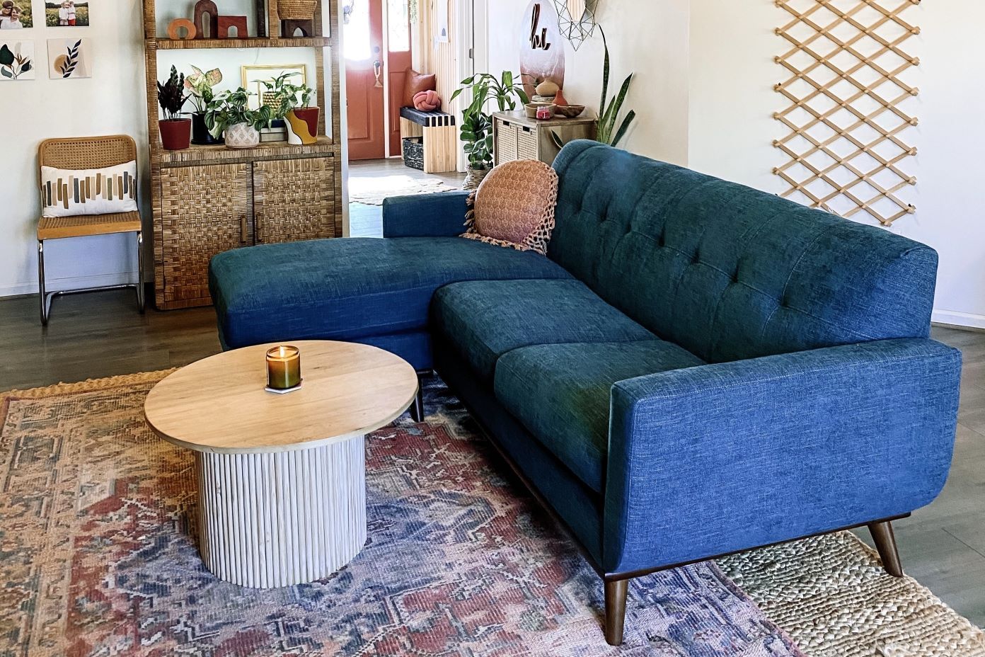Blue sectional sofa in a living room.
