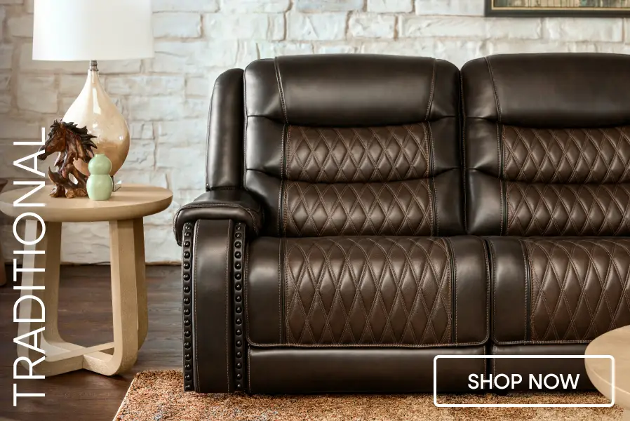 TRADITIONAL SHOP NOW. A dark brown leather reclining sofa with diamond-patterned stitching and nailhead trim.