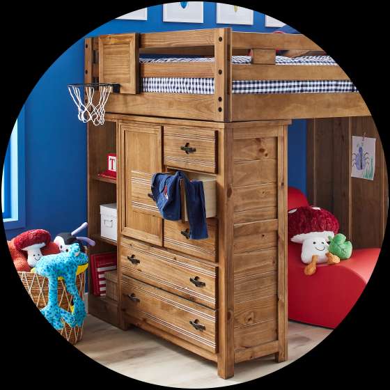 A wooden loft bed with a built-in dresser and a basketball hoop.
