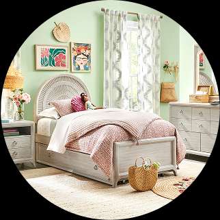 Bedroom with white furniture, including a bed, dresser, and nightstand.
