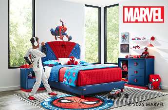 Marvel-themed bedroom set with Spider-Man bed, dresser, and decor.
