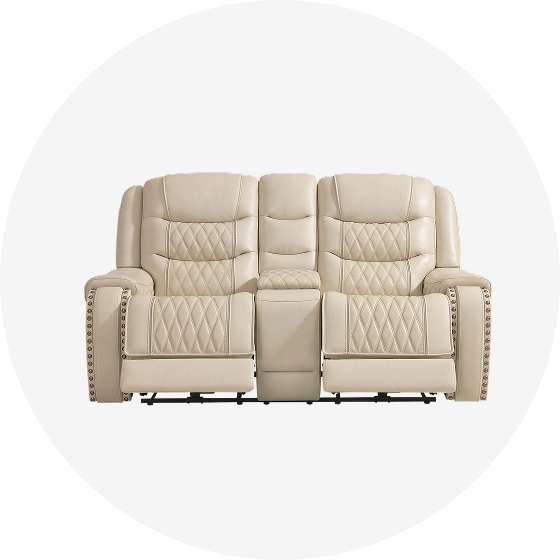 Cream-colored reclining loveseat with a center console.
