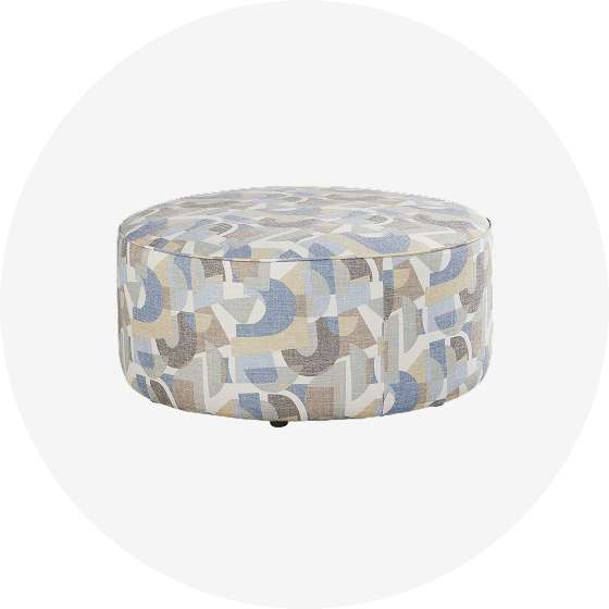 Round ottoman with a geometric pattern.
