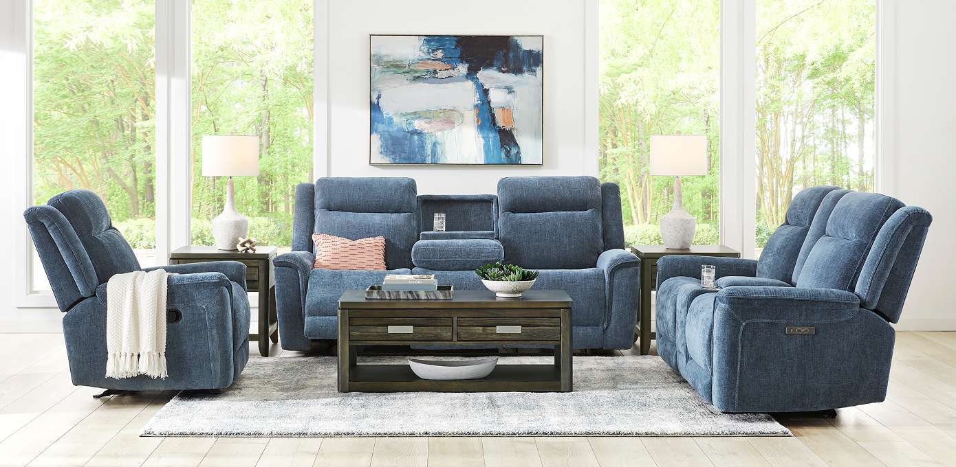 Blue reclining sofa and chairs in a living room.
