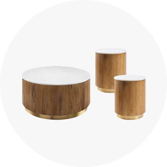 Three wooden tables with white tops and gold bases.
