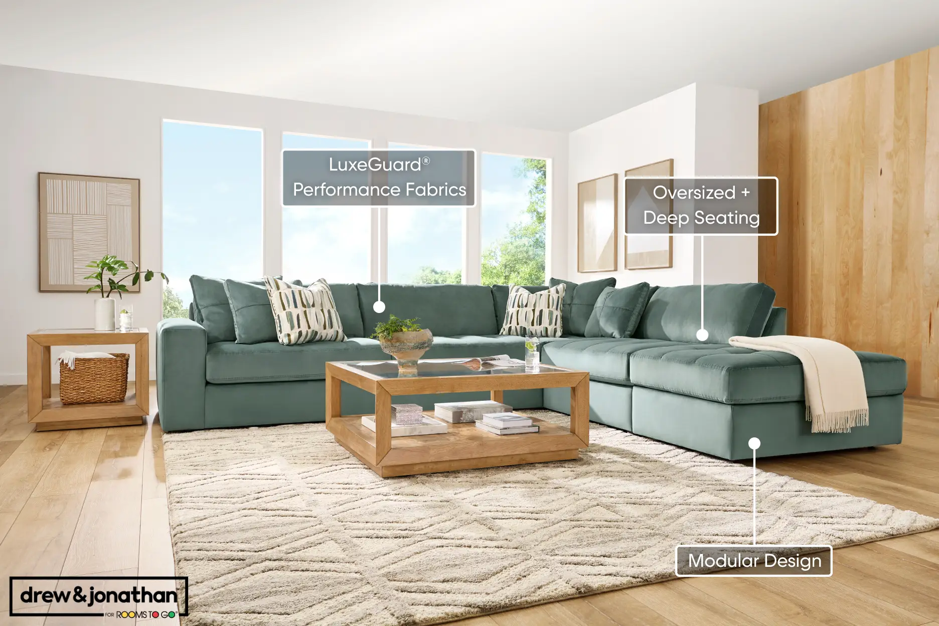 A teal sectional sofa with LuxeGuard performance fabrics, oversized deep seating, and a modular design by Drew & Jonathan.