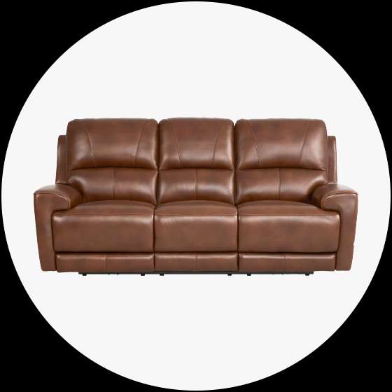 Brown leather reclining sofa.
