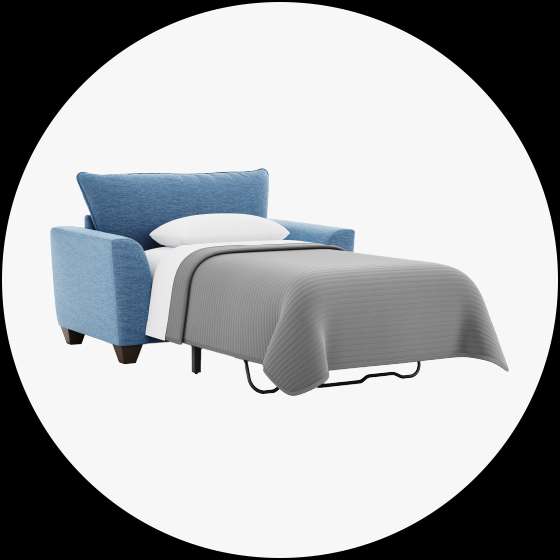 Blue pull-out sofa bed with a gray blanket and white pillow.
