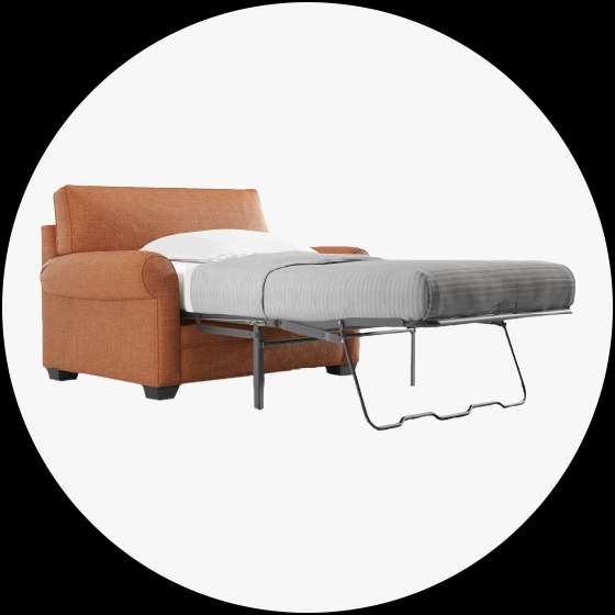 Orange armchair with a pull-out bed.
