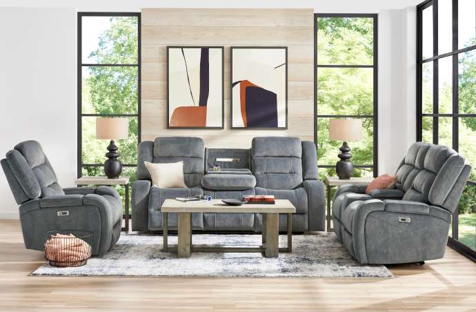 Gray reclining sofa and chairs in a living room setting.
