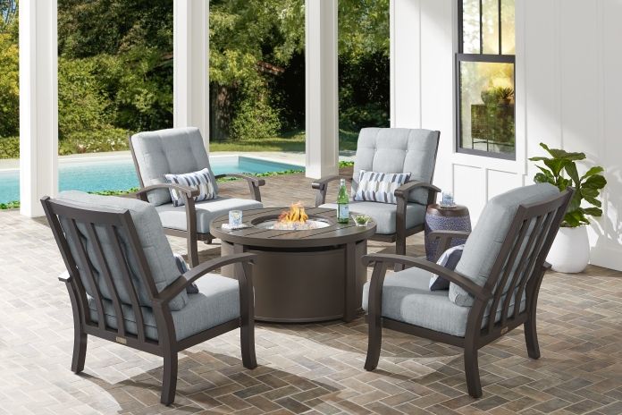 Outdoor seating set with a fire pit.
