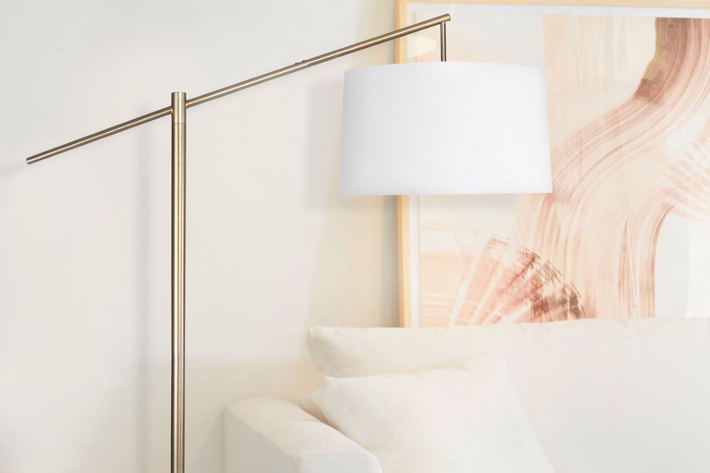 Floor lamp with a white lampshade.
