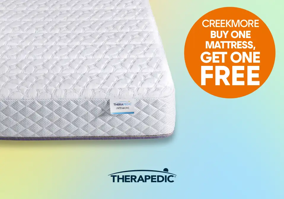CREEKMORE BUY ONE MATTRESS, GET ONE FREE. A white mattress with a blue and purple border.
