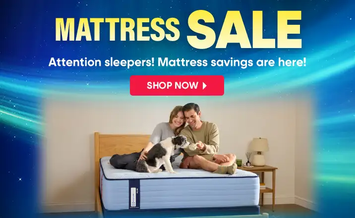MATTRESS SALE. Shop Now. A couple and a dog are sitting on a mattress.
