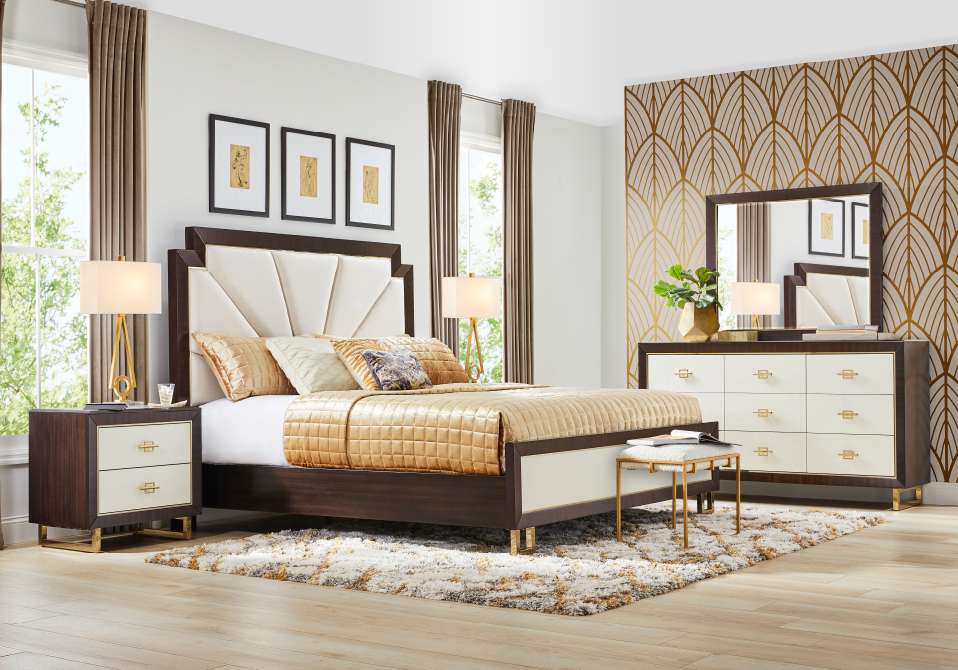 Bedroom set with a bed, nightstand, dresser, mirror, and rug.
