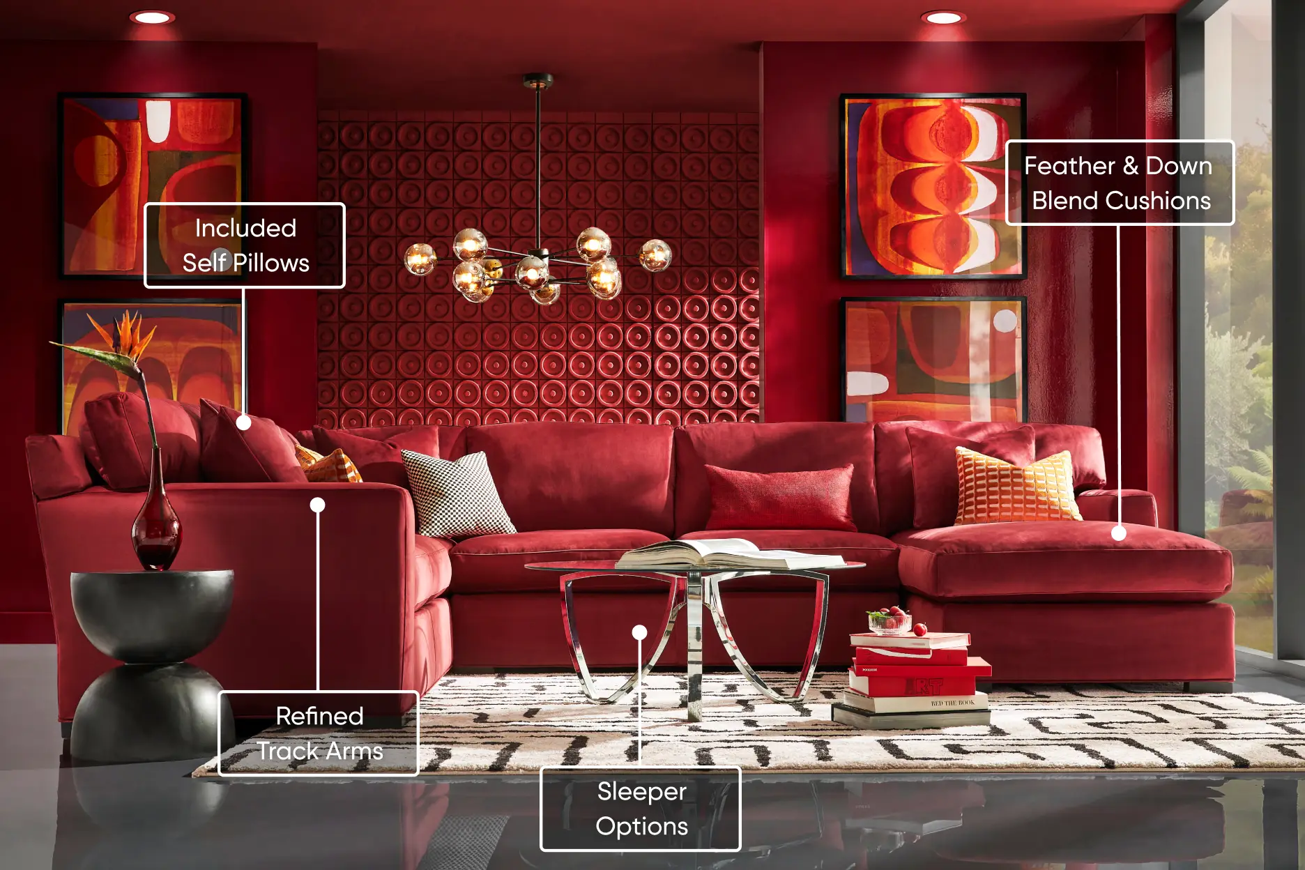A red velvet sectional sofa with track arms, feather and down cushions, and sleeper options in a modern red living room.