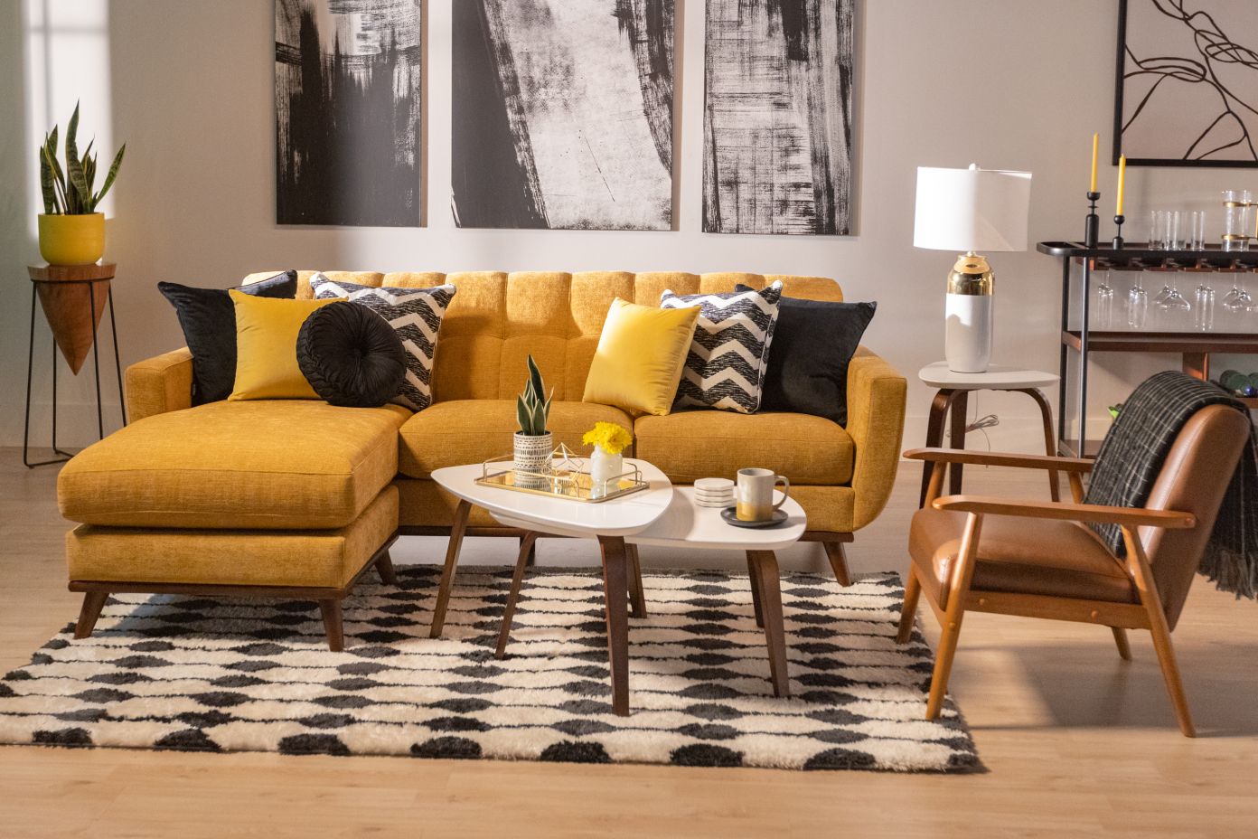 yellow couch with white coffee table