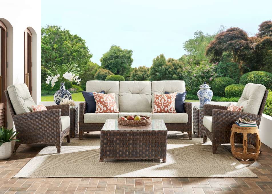 Outdoor furniture set on a patio.
