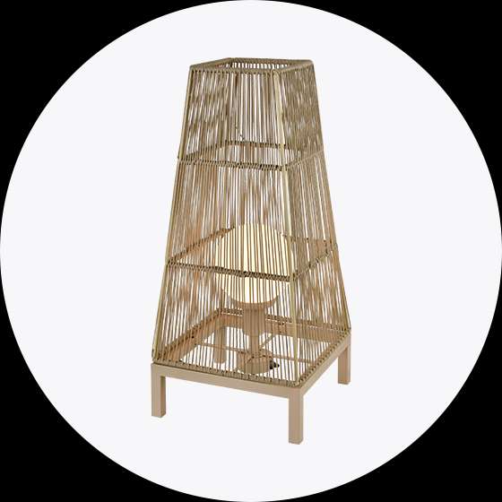 A beige woven rope table lamp with a light bulb inside.
