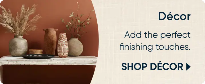 Décor: Find perfect finishing touches. SHOP DÉCOR. A display of vases and dried plants on a console table.