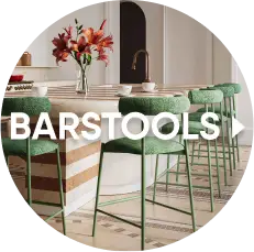 BARSTOOLS: A row of green upholstered barstools with metal frames arranged at a kitchen island.