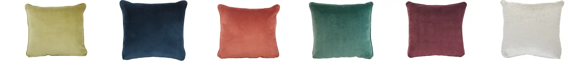 Six velvet throw pillows in various colors.