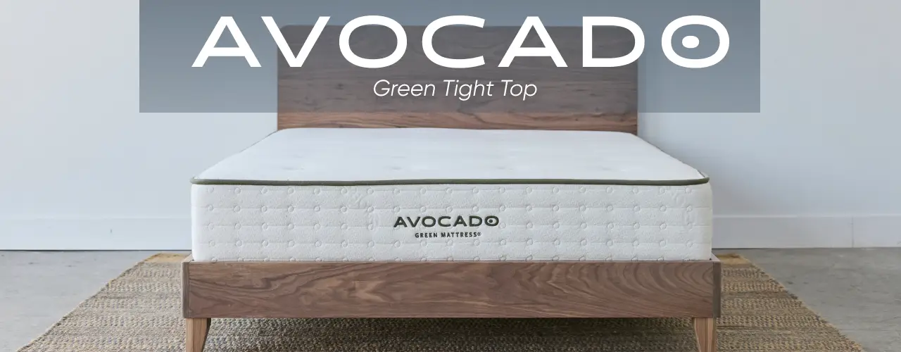 Avocado Green Tight Top mattress on a wooden bed frame.