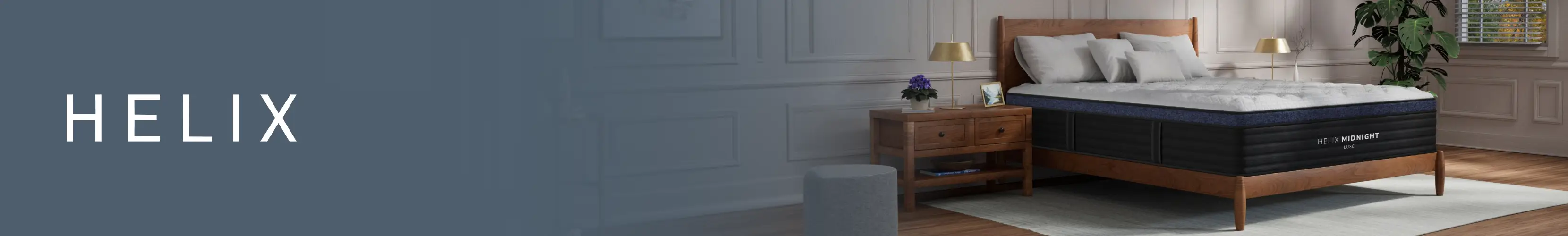 HELIX: A Helix Midnight Luxe mattress on a wooden bed frame in a modern bedroom.