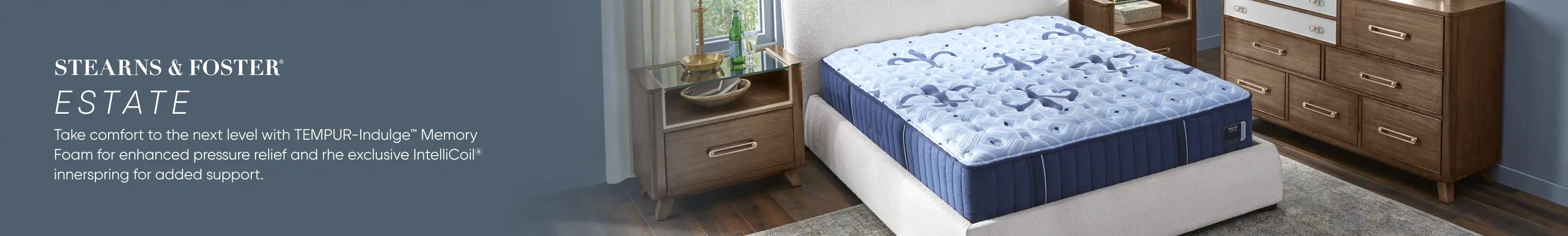 STEARNS & FOSTER ESTATE. A bed with a blue mattress in a bedroom.
