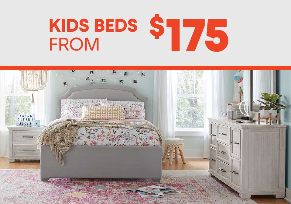 KIDS BEDS FROM $175. A bedroom with a bed, dresser, and rug.
