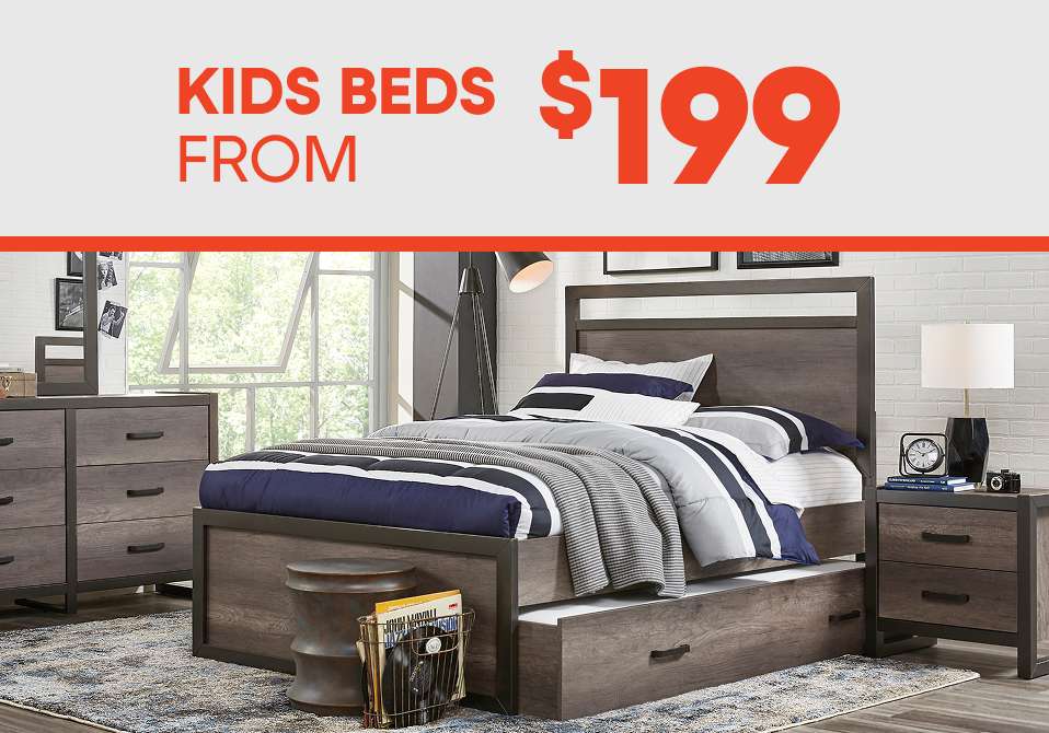 KIDS BEDS FROM $199. A bedroom set with a bed, dresser, and nightstand.
