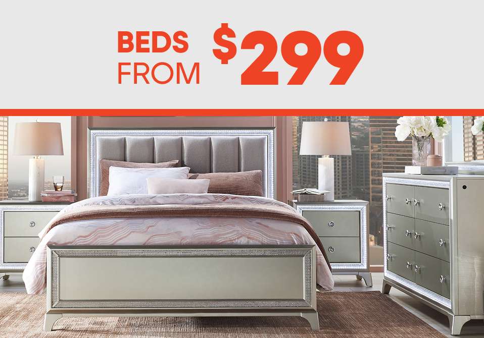 Beds from $299. A bedroom set with a bed, nightstands, and a dresser.

