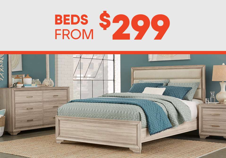 BEDS FROM $299. A bedroom set with a bed, dresser, and nightstand.
