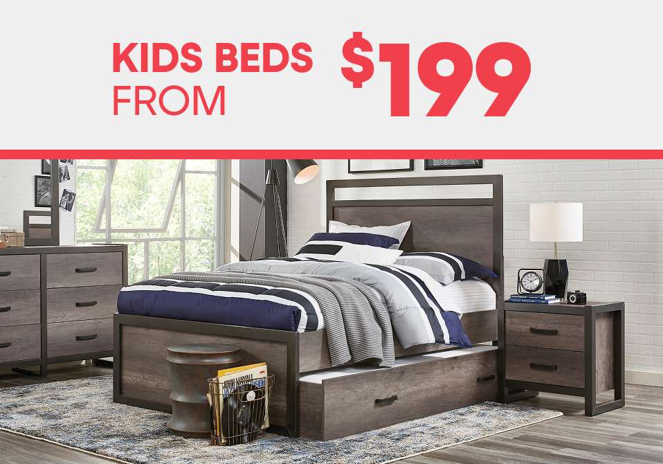 KIDS BEDS FROM $199. A bedroom set with a bed, dresser, and nightstand.
