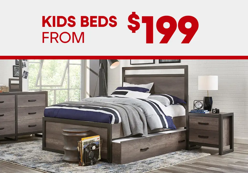 KIDS BEDS FROM $199. A bedroom set with a bed, dresser, and nightstand.
