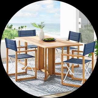 Outdoor dining set with a wooden table and blue chairs.
