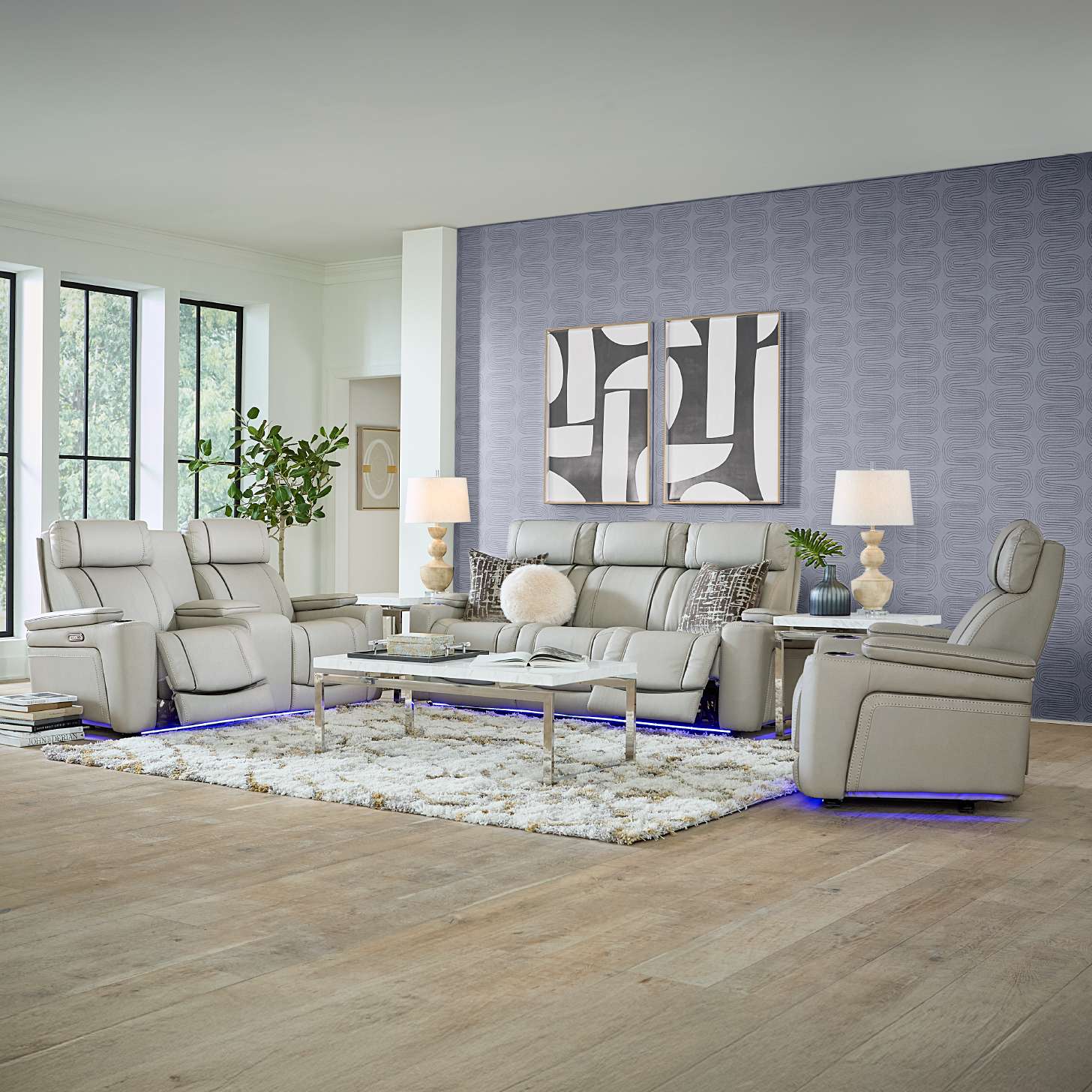 Living room furniture set with a sofa, two recliners, and a coffee table.
