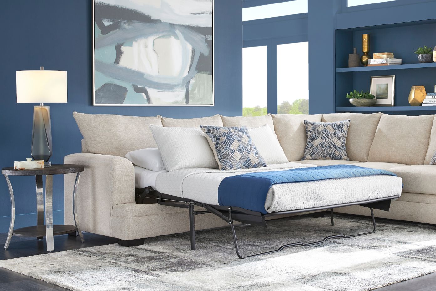 tan couch that pulls out into a bed 