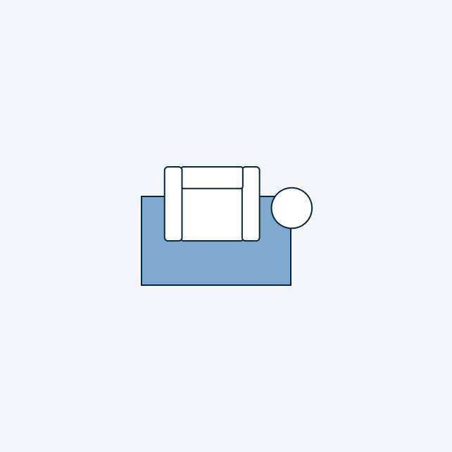 Top-down view of a chair and side table.
