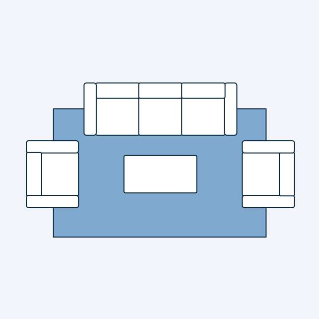 A top-down view of a living room layout with a sofa, two armchairs, and a coffee table on a blue rug.
