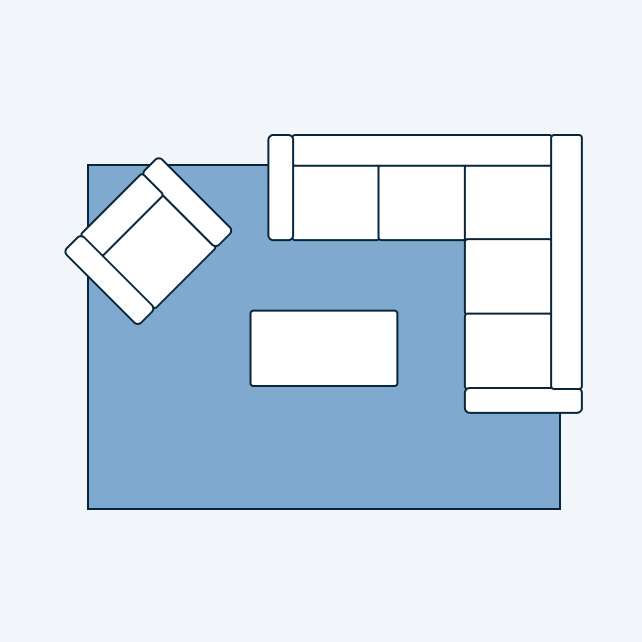 Top-down view of a living room layout with a blue rug, sectional sofa, armchair, and coffee table.
