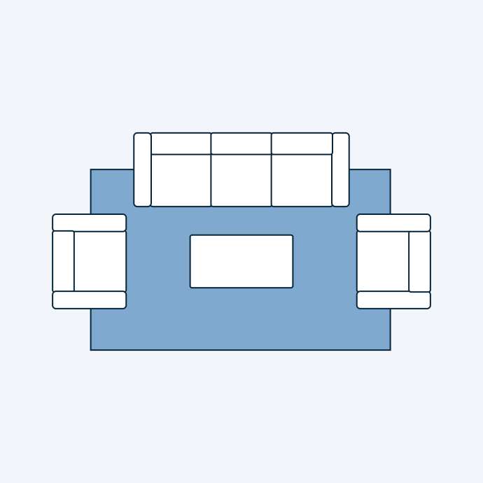 Top-down view of a living room layout with a sofa, two armchairs, a coffee table, and a rug.
