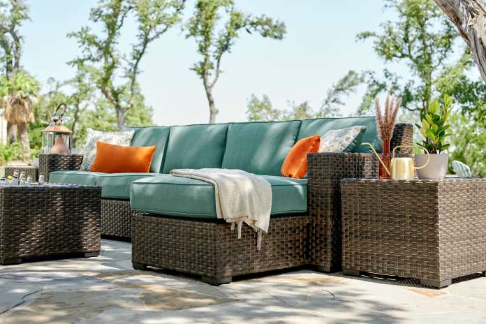 blue outdoor couch with blanket 