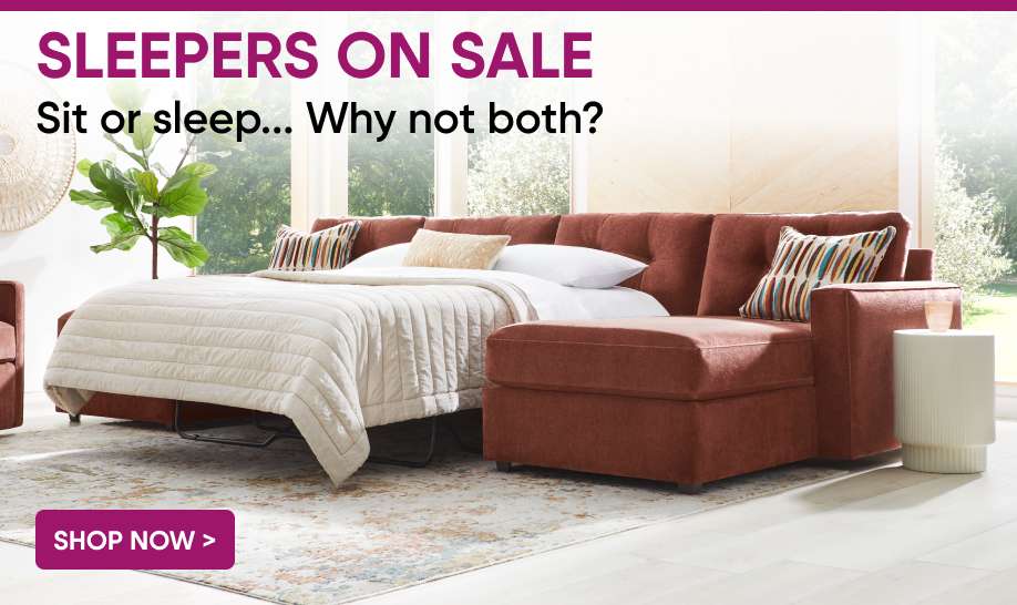 SLEEPERS ON SALE. Sit or sleep... Why not both? A red sectional sofa with a pull-out bed.
