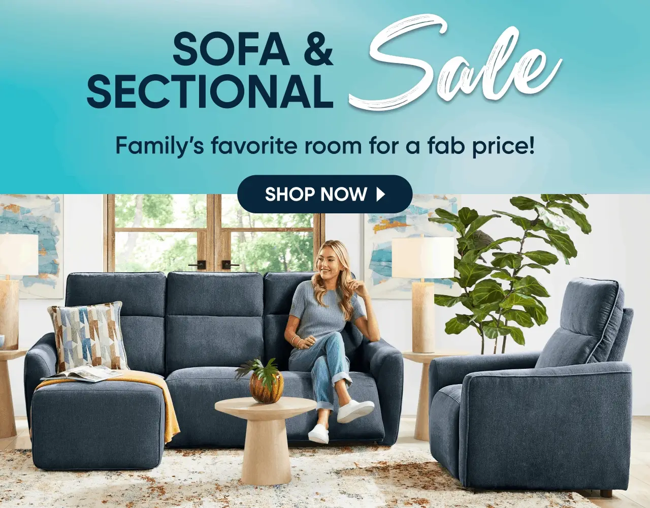 SOFA & SECTIONAL Sale: Family's favorite room for a fab price! A woman sits on a blue sofa in a modern living room.