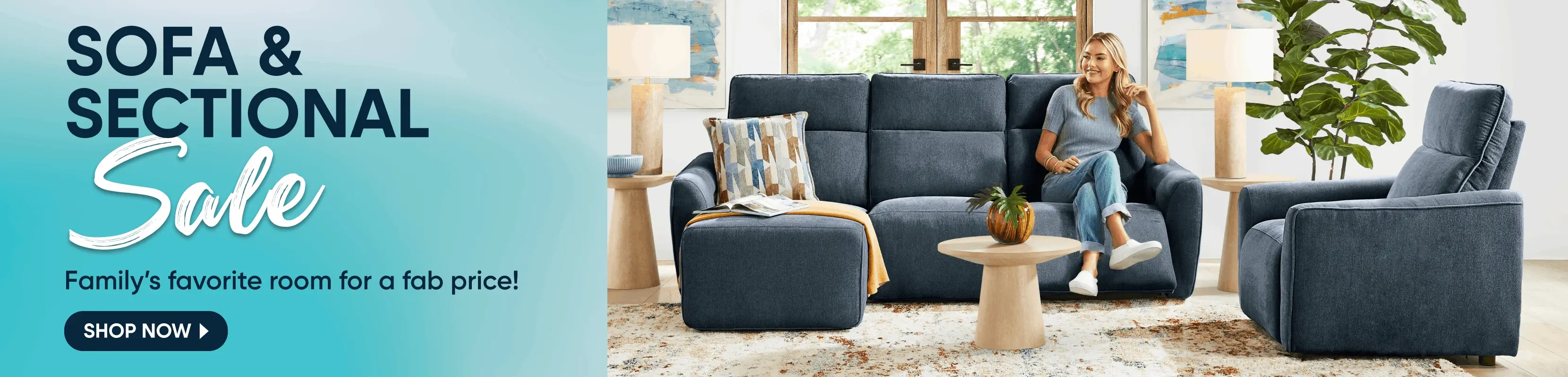 SOFA & SECTIONAL Sale: Family's favorite room for a fab price! A woman sits on a blue sofa in a modern living room.