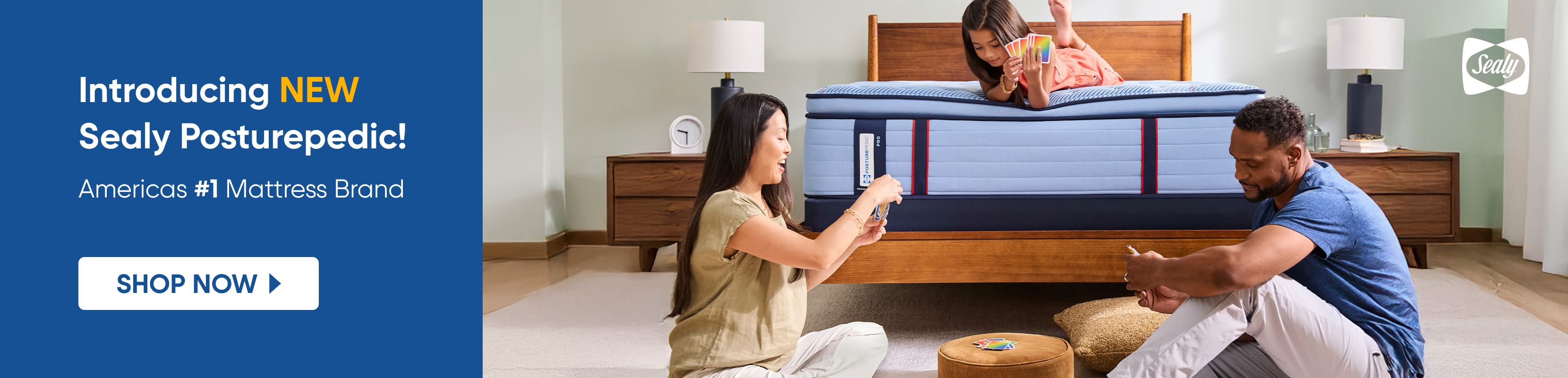 Introducing NEW Sealy Posturepedic! Americas #1 Mattress Brand. A family playing cards on a new mattress.

