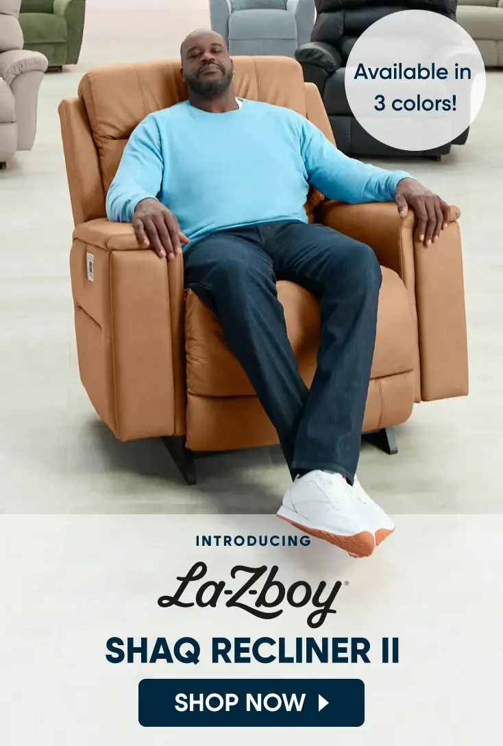 Introducing La-Z-Boy Shaq Recliner II. Available in 3 colors! Shaquille O'Neal sits in a tan leather recliner. Shop now.
