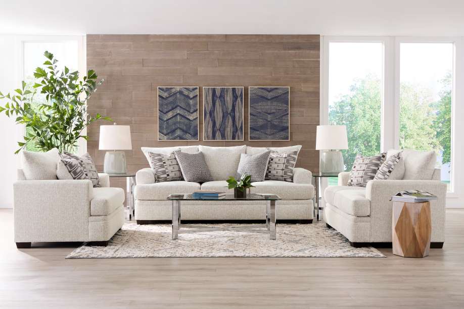 Living room furniture set with a sofa, two armchairs, and a coffee table.
